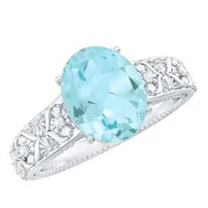 Oval Sky Blue Topaz and Diamond Vintage Style Solitaire Ring