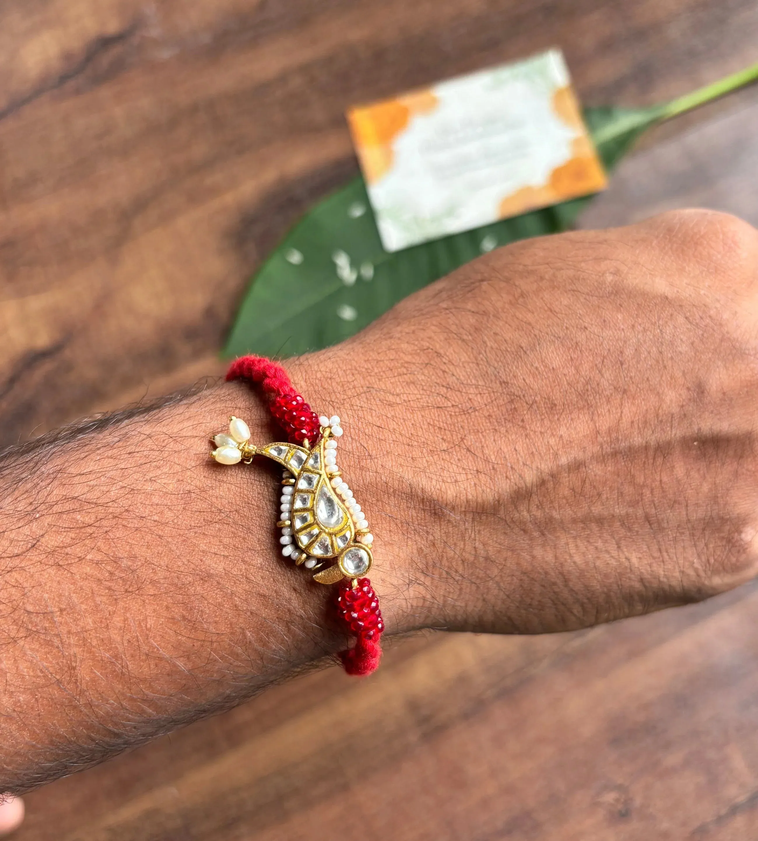 Panchhi Crimson Red Kundan Rakhi