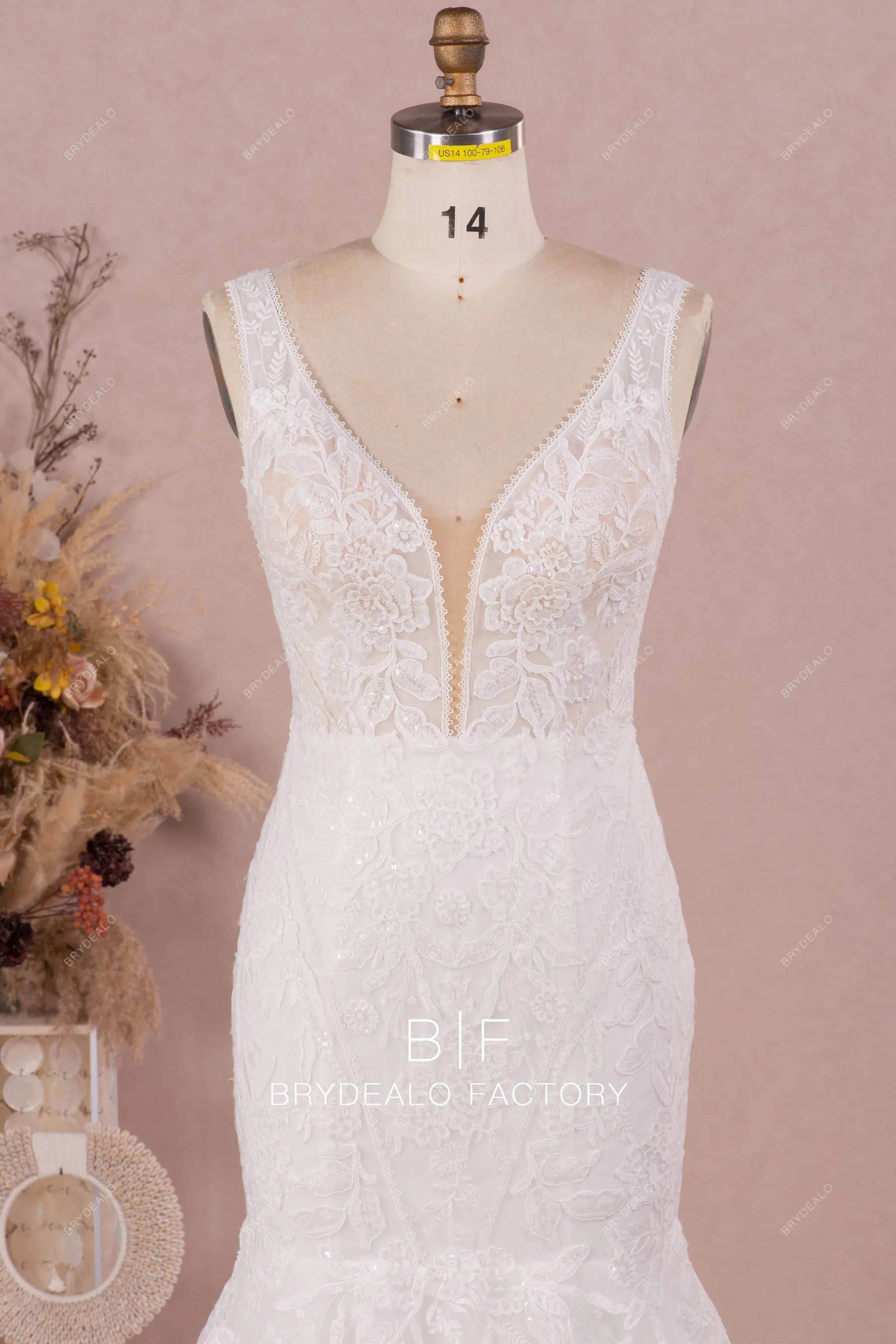 Plunging Neck Sleeveless Designer Lace Trumpet Garden Wedding Dress