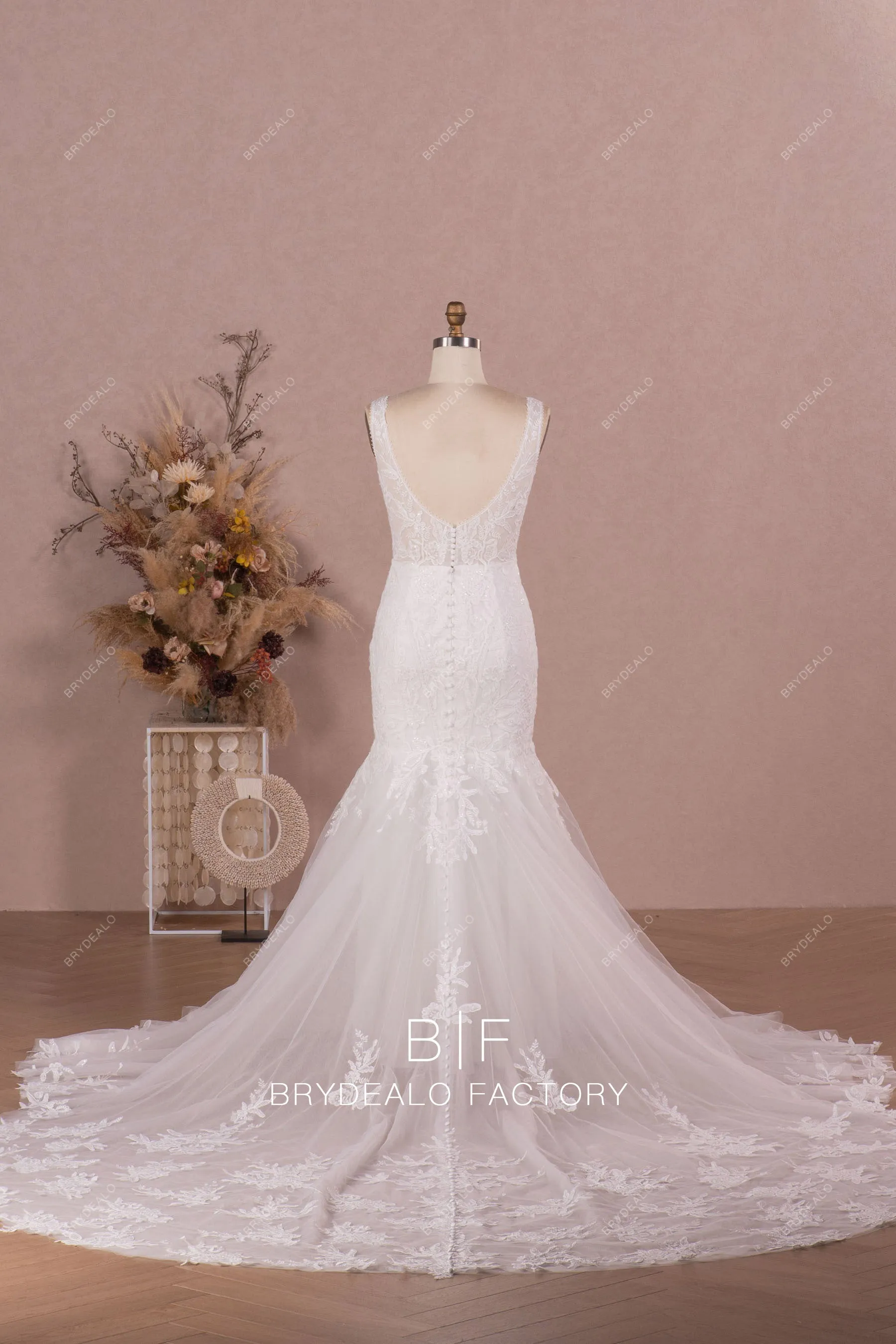 Plunging Neck Sleeveless Designer Lace Trumpet Garden Wedding Dress