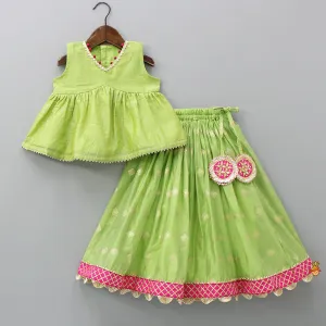 Pre Order: Contrasting Potli Buttons Detail Leaf Green Top And Gota Tassels Enhanced Lehenga