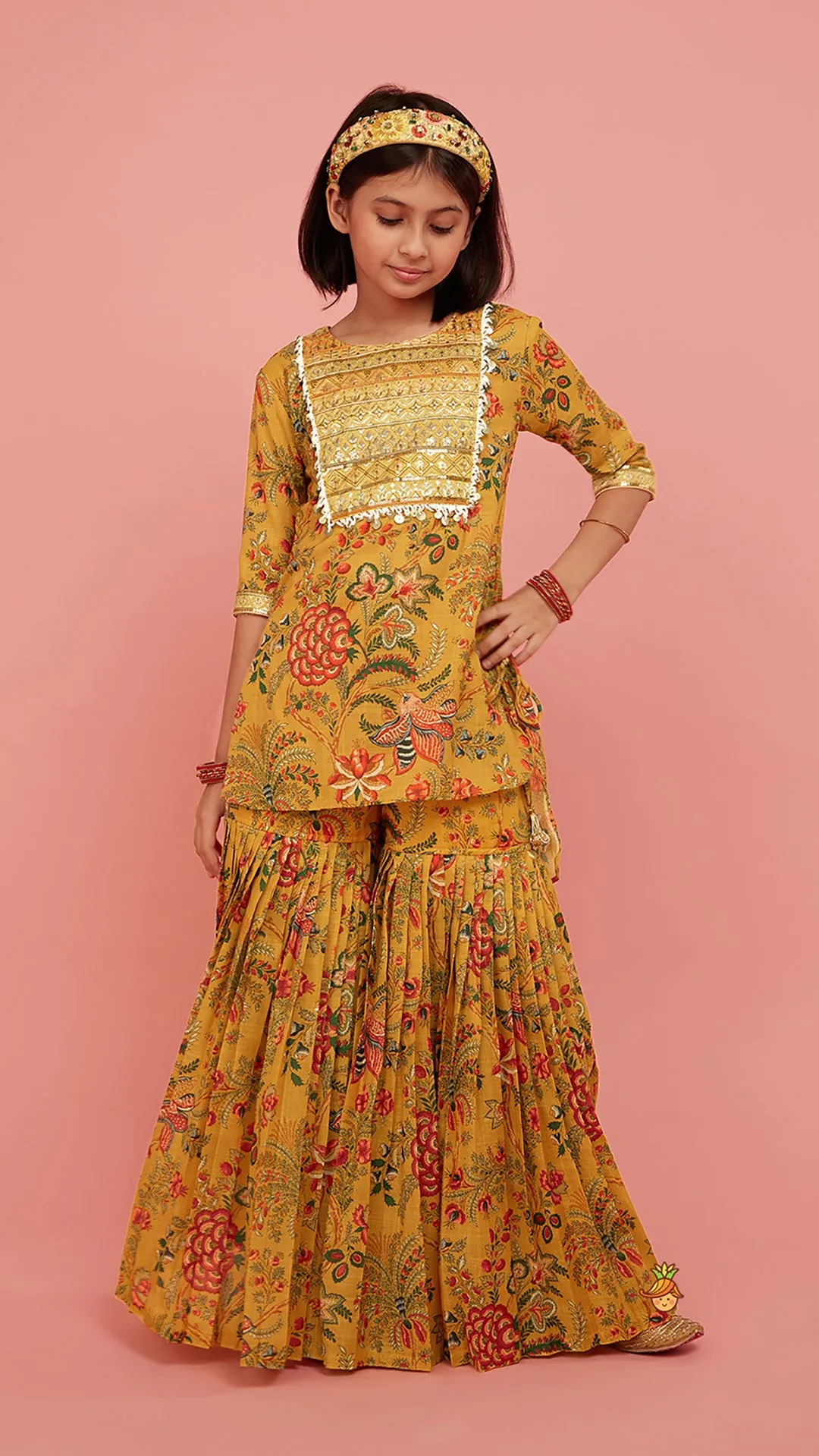 Pre Order: Intricate Yoke Gota Embroidered Mustard Printed Kurti And Pleated Sharara With Organza Sequined Dupatta