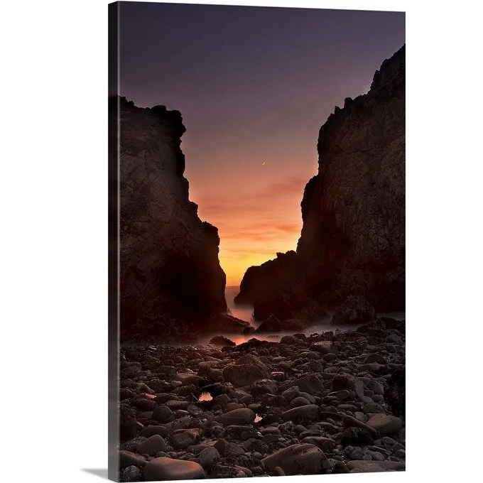 "A crescent moon sets through a dusk-colored sky at Pfeiffer Beach, CA, USA" Canvas Wall Art