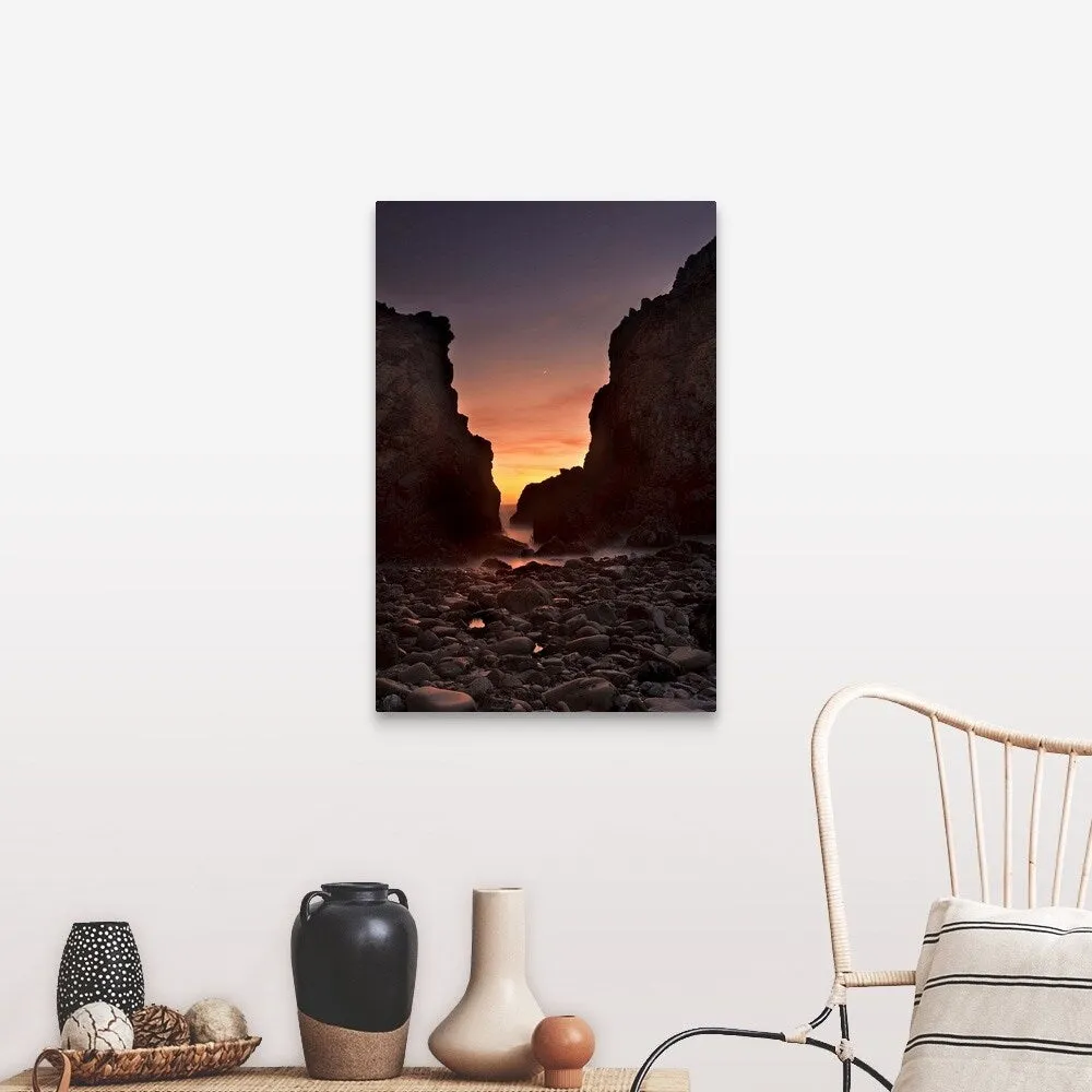 "A crescent moon sets through a dusk-colored sky at Pfeiffer Beach, CA, USA" Canvas Wall Art