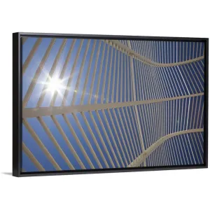 "A view from inside the arched walkway structure at the Athens Olympic Sports " Black Float Frame Canvas Art