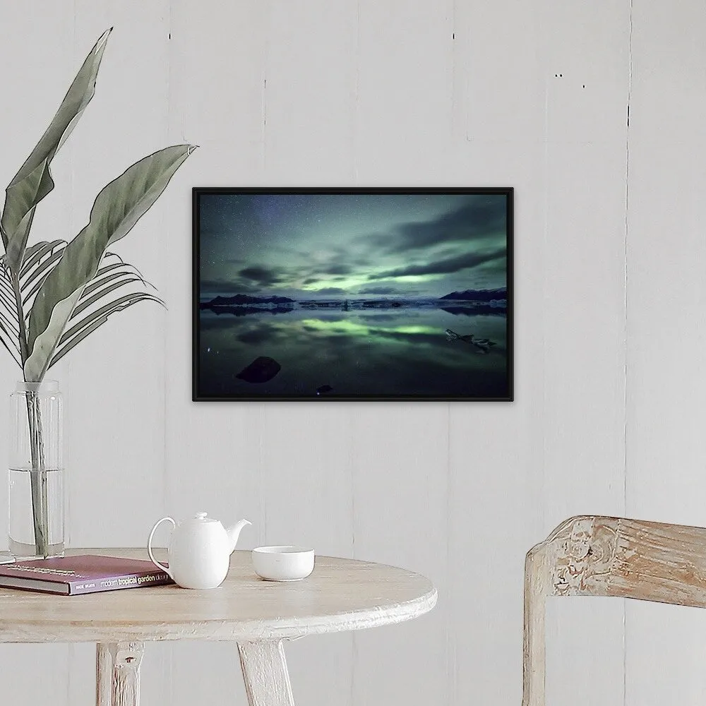 "Aurora borealis over Jokulsarlon glacial lagoon in south Iceland." Black Float Frame Canvas Art