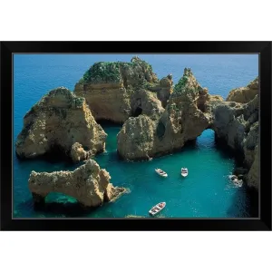 "Boats and rock formations" Black Framed Print