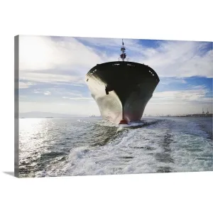 "Bow view of cargo ship sailing out of port." Canvas Wall Art