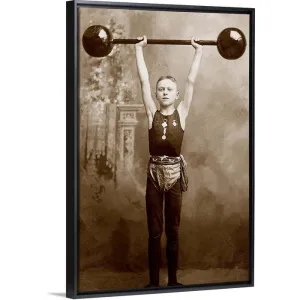 "Boy lifting weights" Black Float Frame Canvas Art