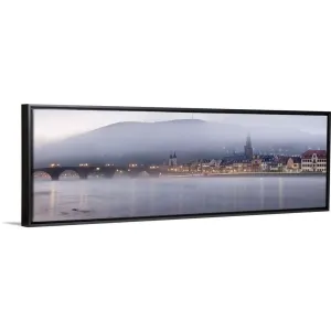 "Bridge across a river with city lit up at morning, Germany" Black Float Frame Canvas Art