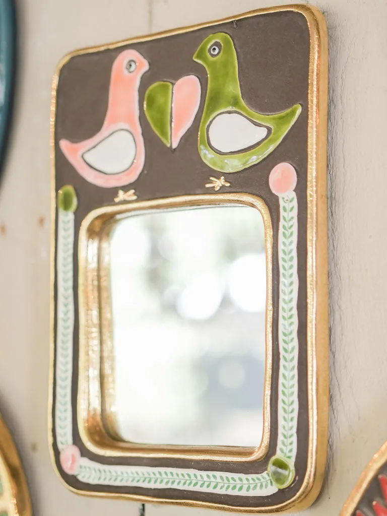 Rectangular mid-century mirror w/ pink & green lovebirds - Mithe Espelt (1924-2021) - 9¾" x 7½"