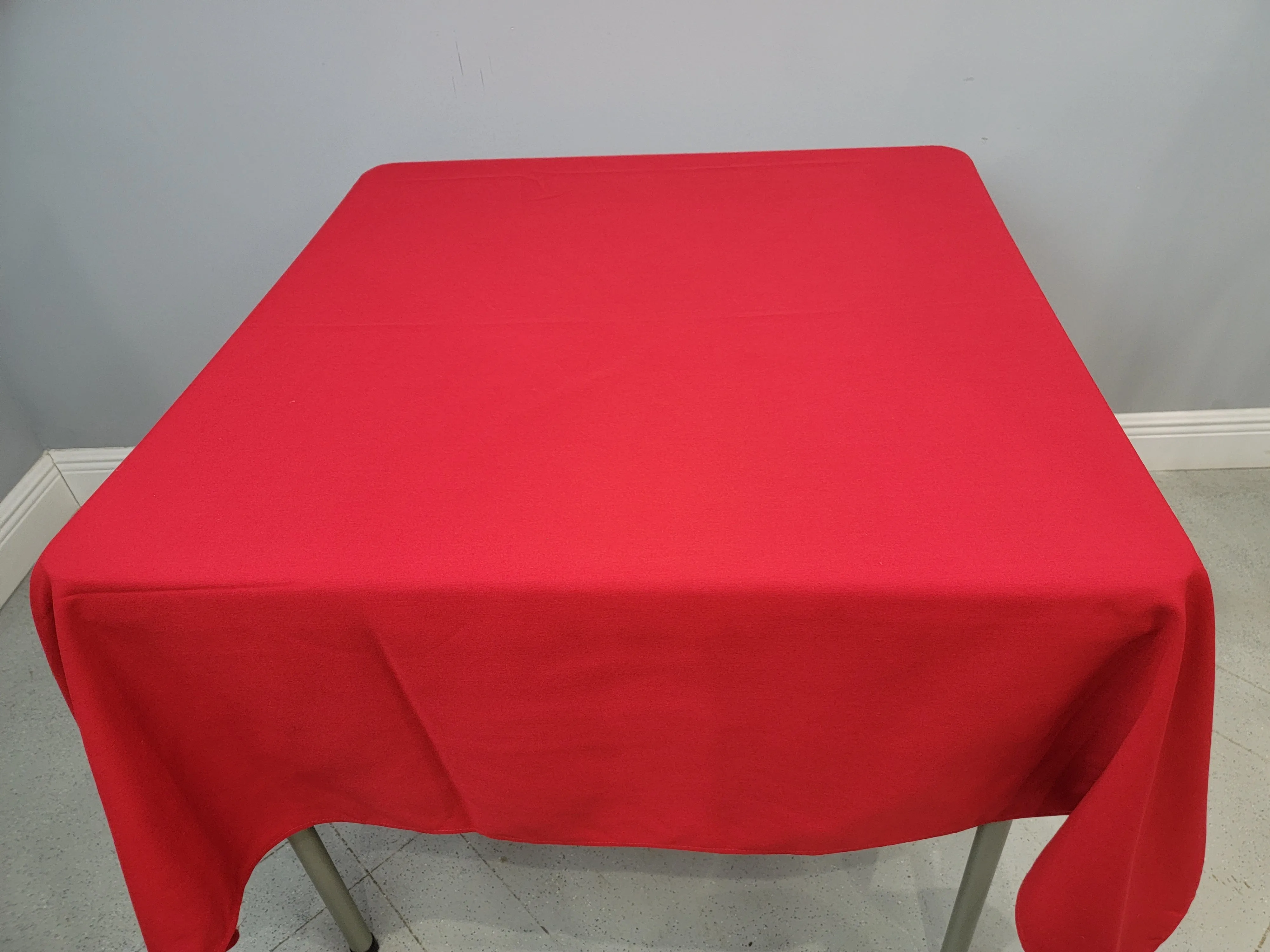 Red 52" x 114" Rectangular Spun Poly Tablecloth Special