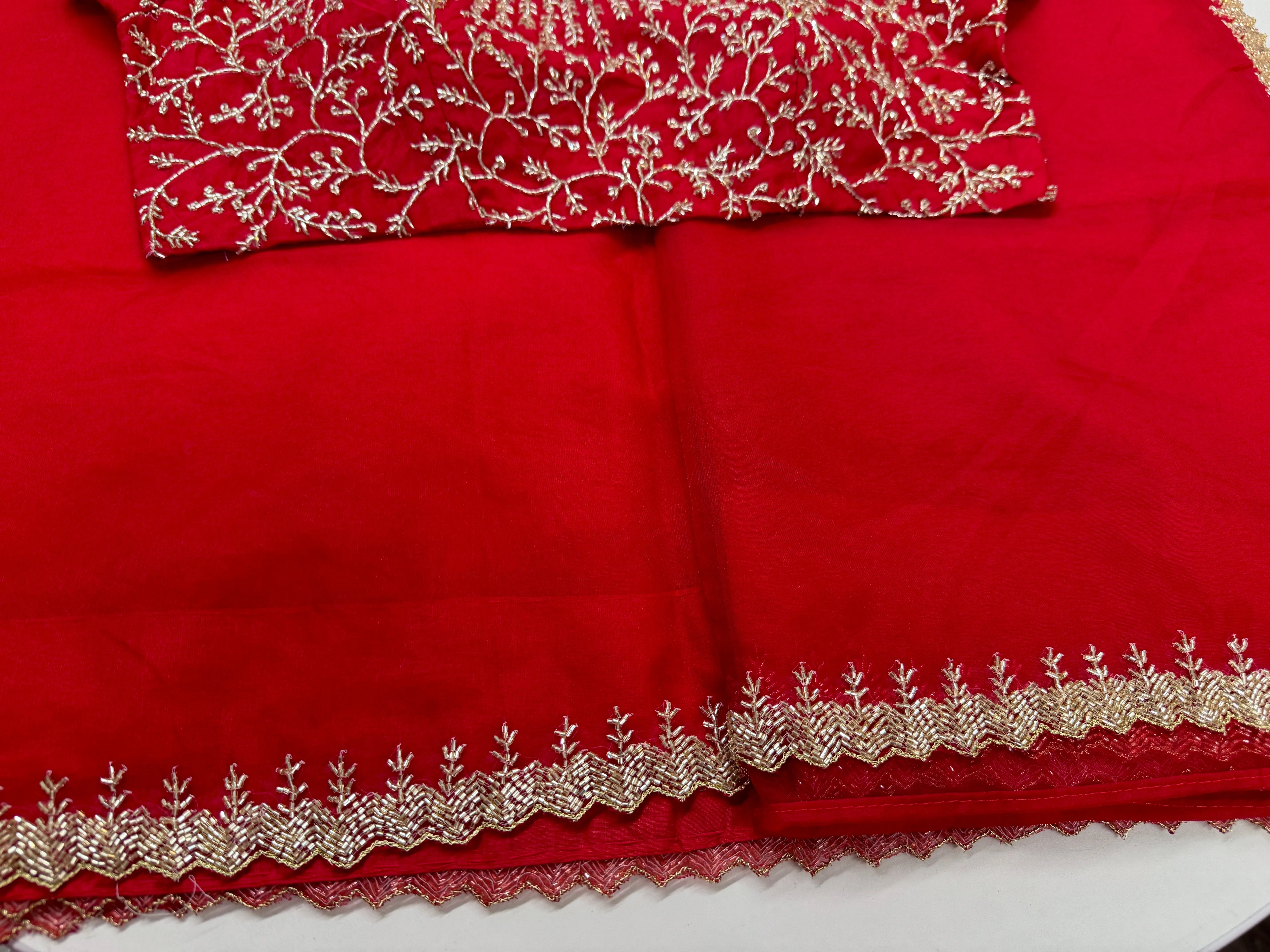 Rose red embroidered Organza saree with stitched blouse