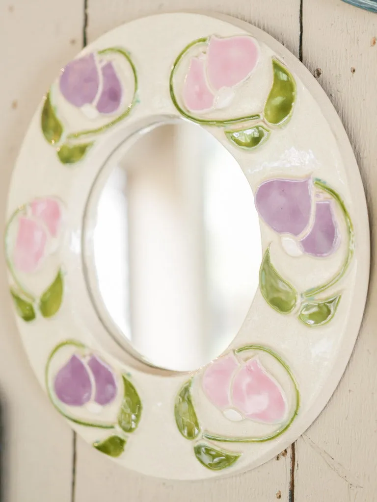 Round mid-century modern mirror w/ pink & purple flowers -Mithe Espelt (1924-2021) - 11½"