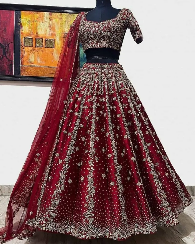 Sequined Embroidered Silk Maroon Lehenga Choli Set with Net Dupatta