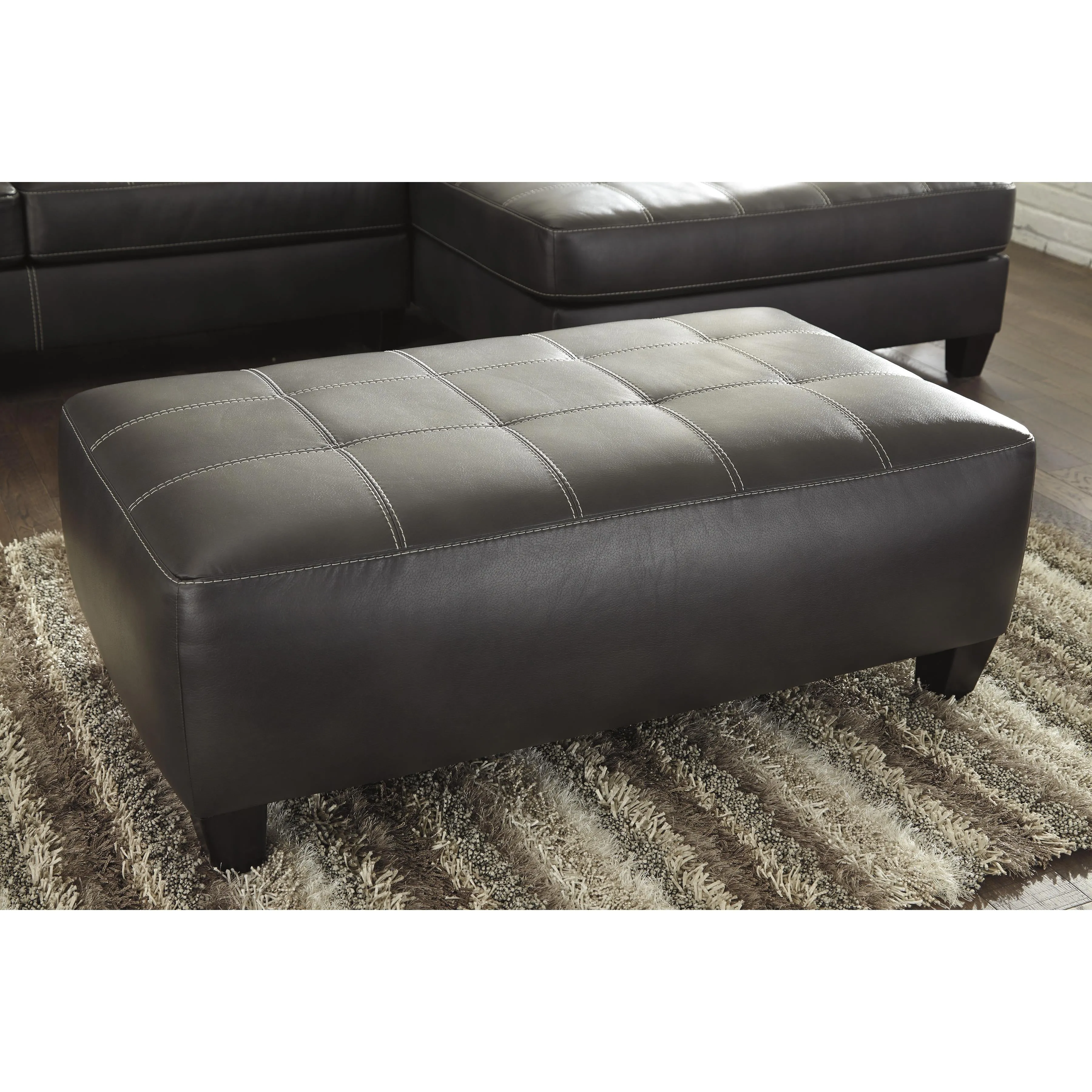 Signature Design by Ashley Nokomis Leather Look Ottoman 8772108