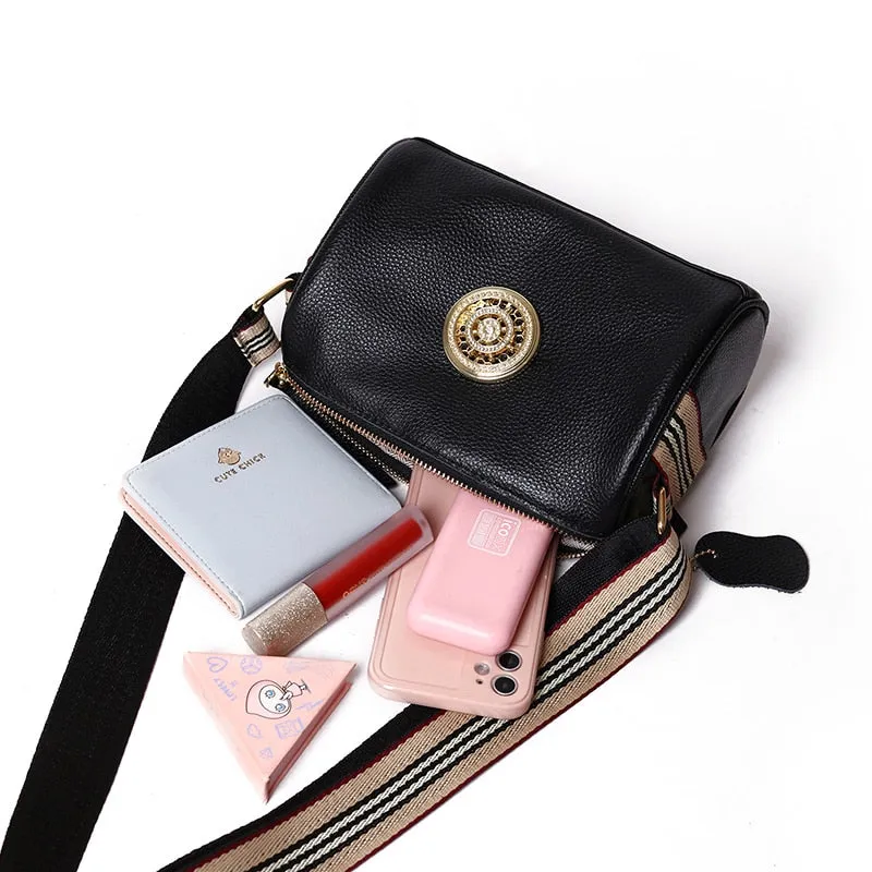 Small and Compact Crossbody Bag with Rotating Charm Accent