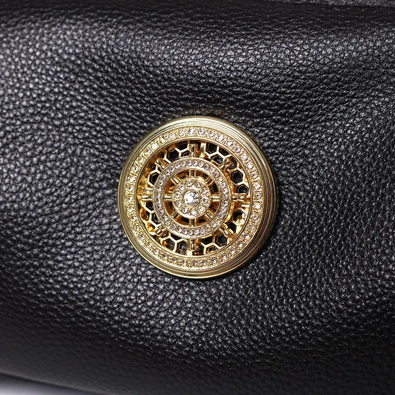 Small and Compact Crossbody Bag with Rotating Charm Accent