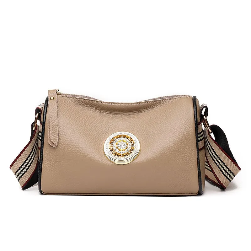 Small and Compact Crossbody Bag with Rotating Charm Accent