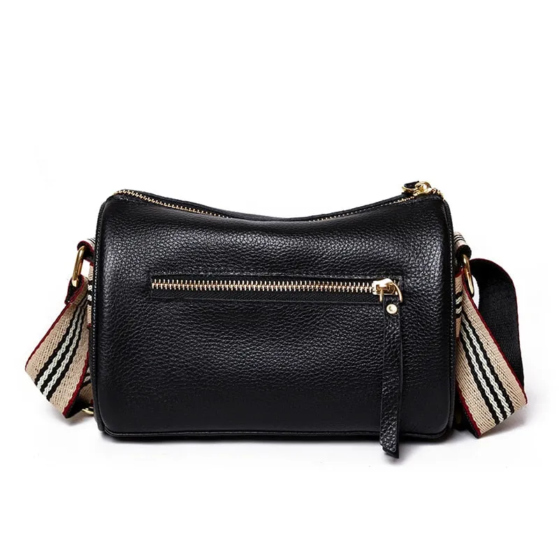 Small and Compact Crossbody Bag with Rotating Charm Accent