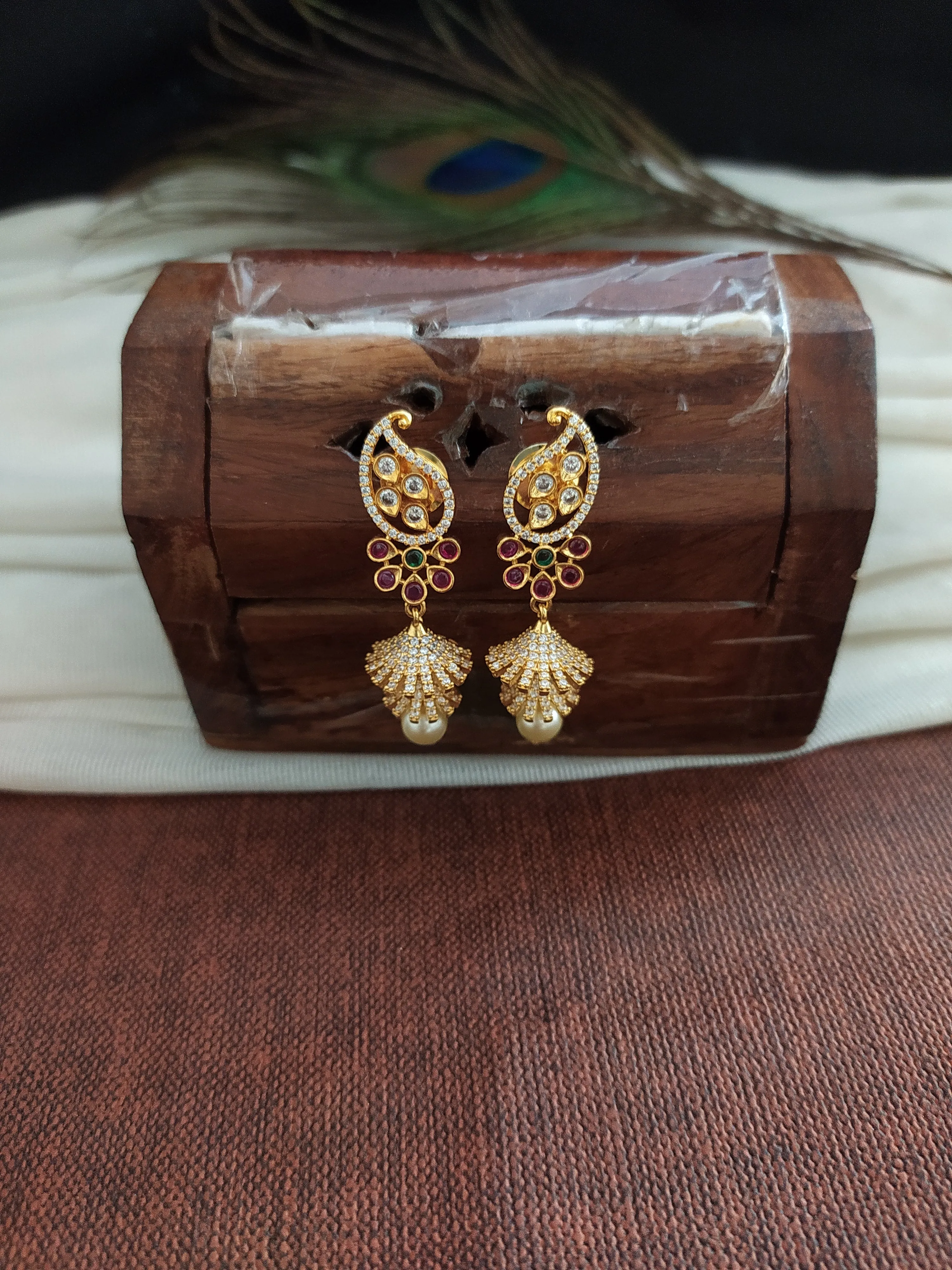 Small Mango Design Gold-plated jhumki with zircon stones