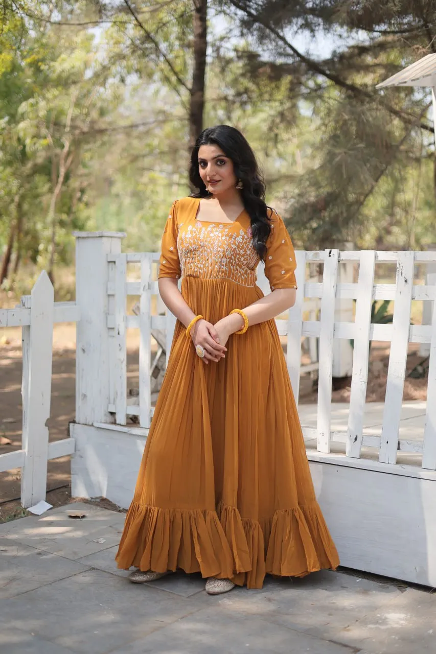 Sparkling Multithreaded Embroidered Faux Georgette Mustard Yellow Gown with Puff Sleeves