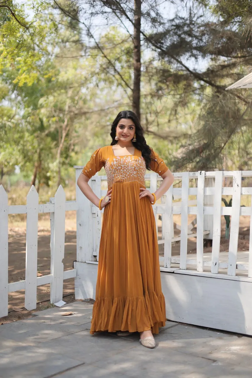 Sparkling Multithreaded Embroidered Faux Georgette Mustard Yellow Gown with Puff Sleeves