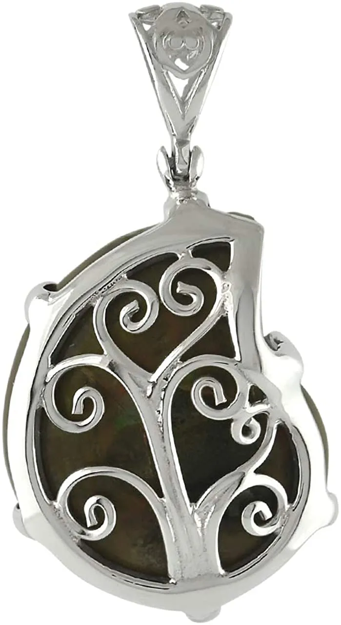 Starborn Petrified ammonite 925 sterling silver pendant with filigree eyelet and tree of life decoration on the back.