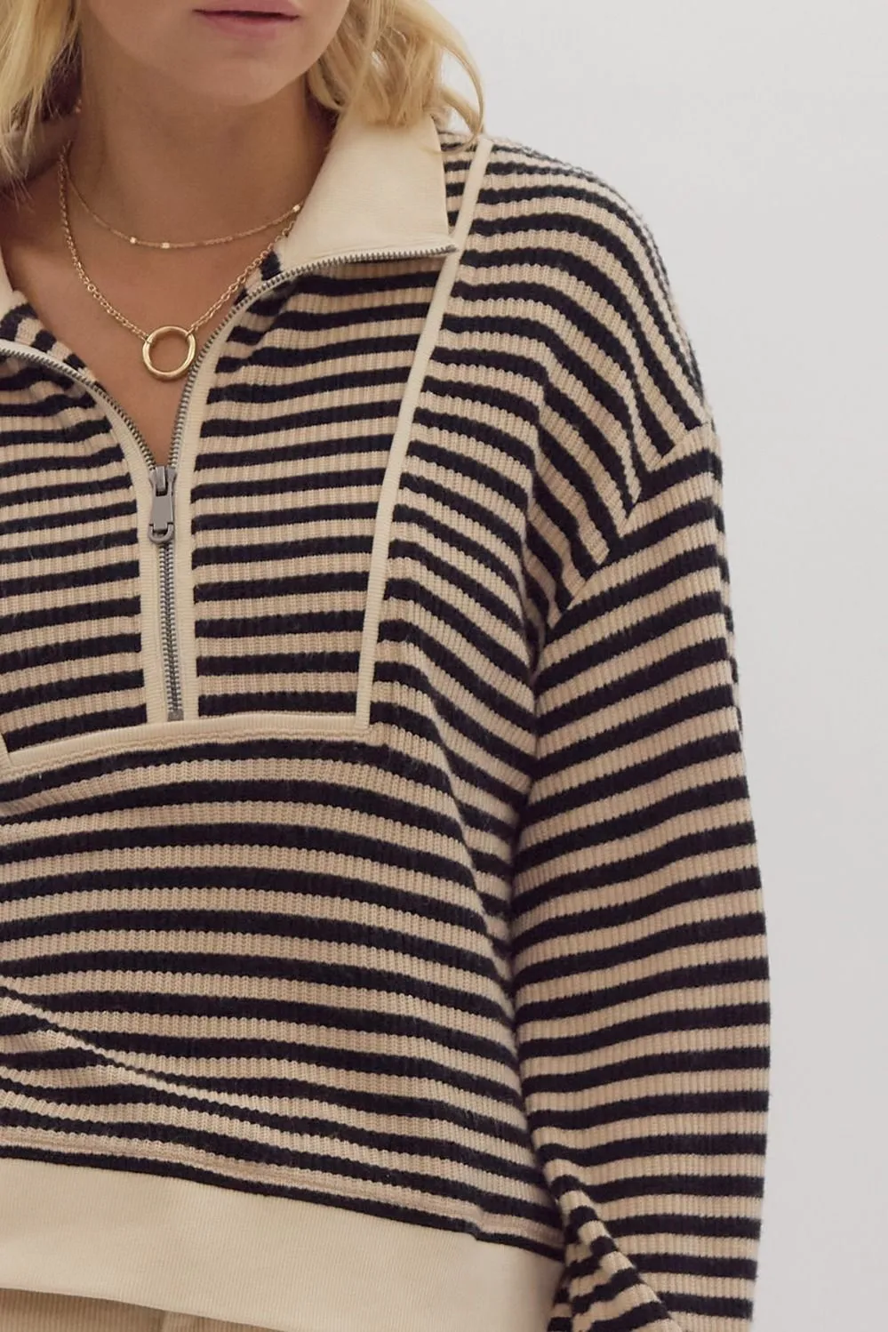 Striped long sleeve half-zip pullover top