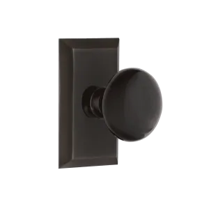 Studio Short Plate with Black Porcelain Knob in Timeless Bronze