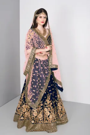 Stunning Blue Colored Partywear Embroidered Lehenga Choli