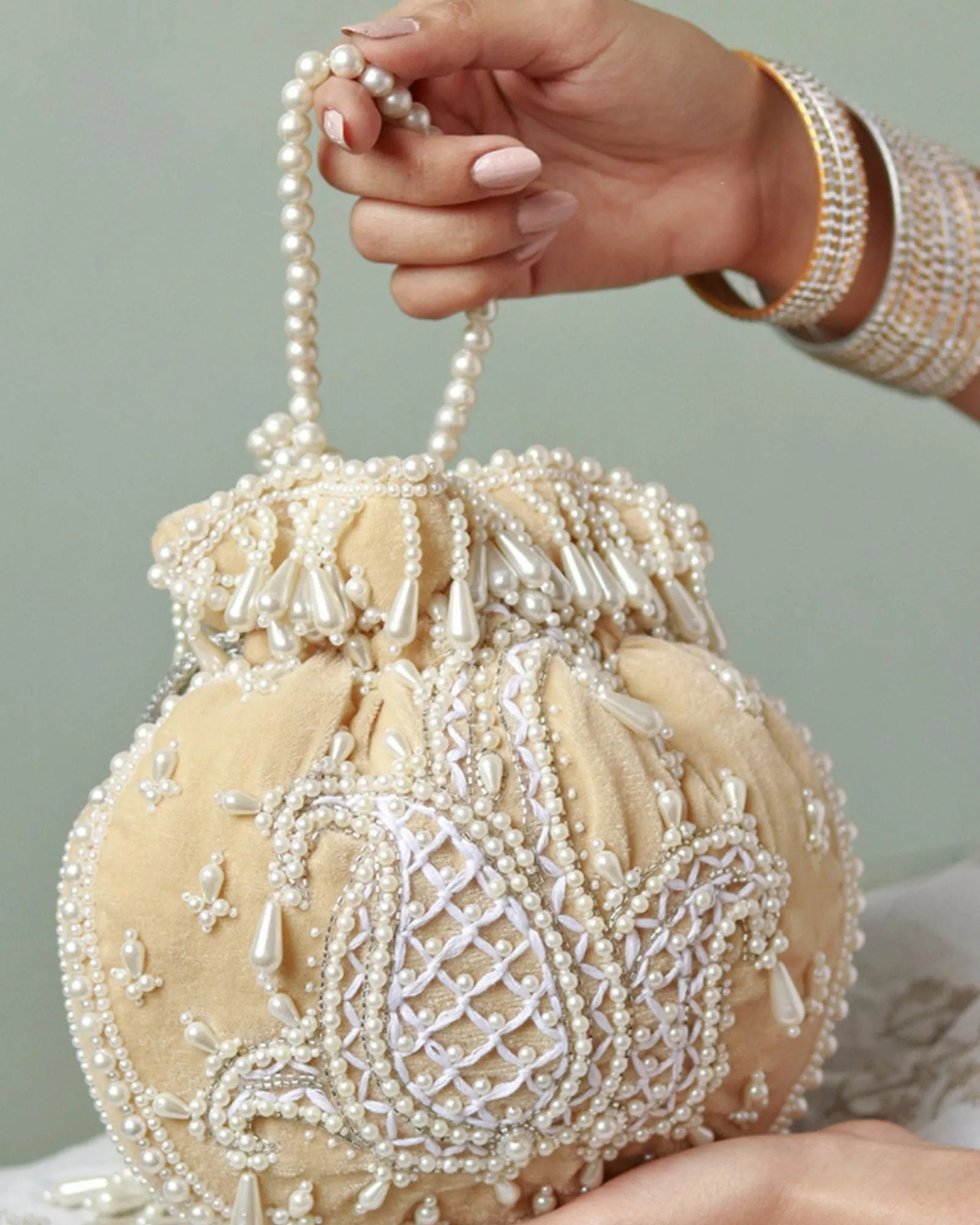 Sukoon Hand Embroidered Potli with Pearl Handle