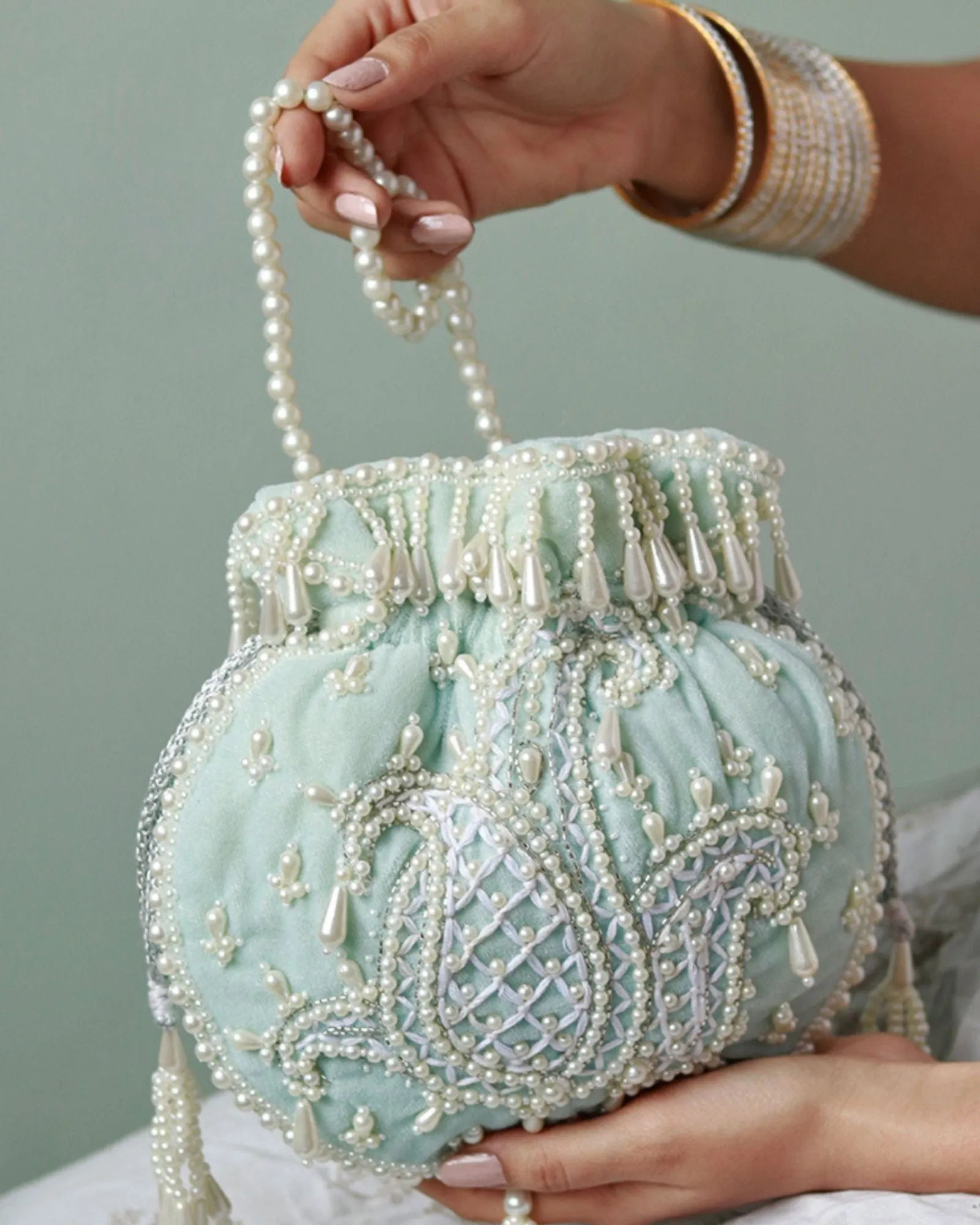 Sukoon Hand Embroidered Potli with Pearl Handle