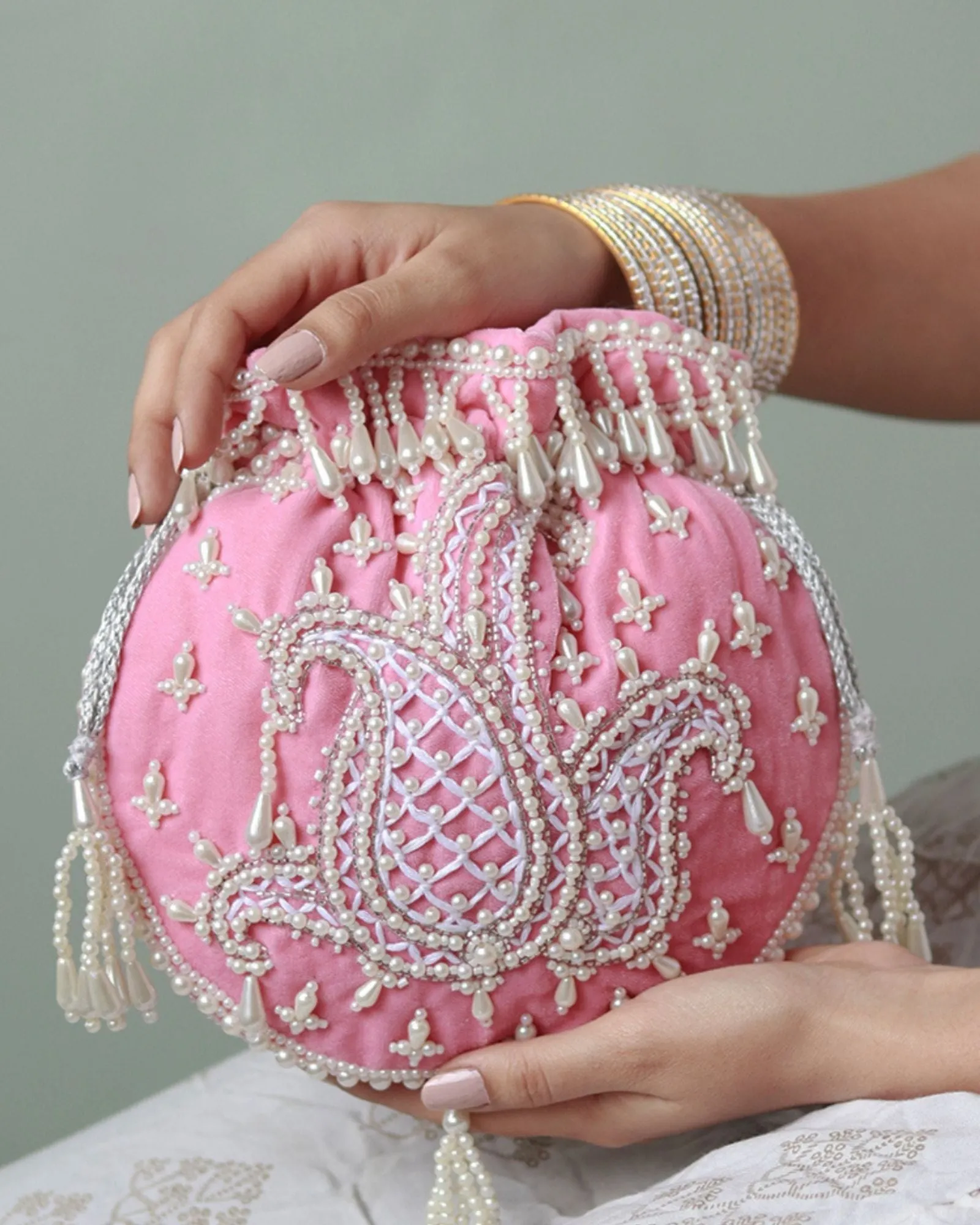 Sukoon Hand Embroidered Potli with Pearl Handle