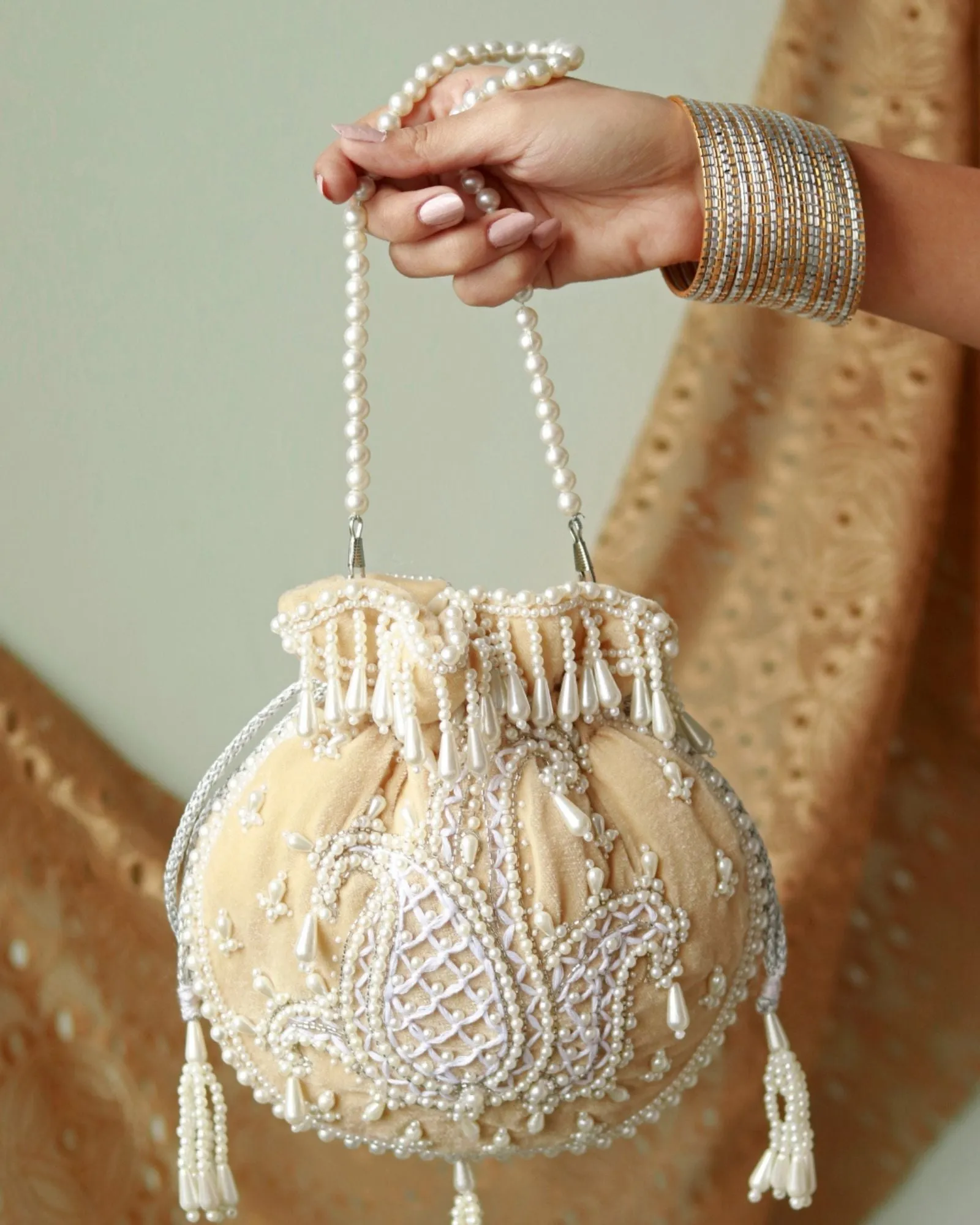 Sukoon Hand Embroidered Potli with Pearl Handle