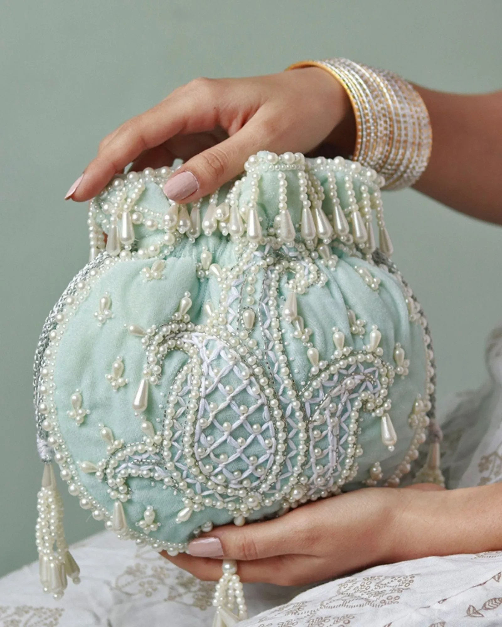 Sukoon Hand Embroidered Potli with Pearl Handle