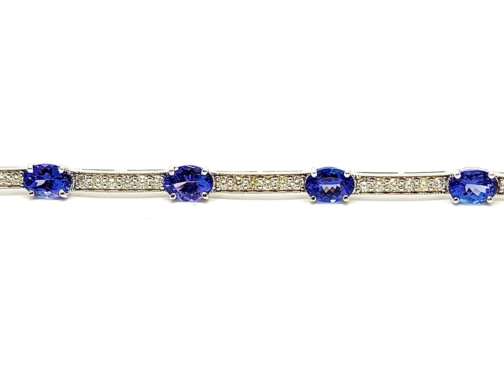 TANZANITE AND DIAMOND STATION BRACELET IN 14K WHITE GOLD AD NO # 2709