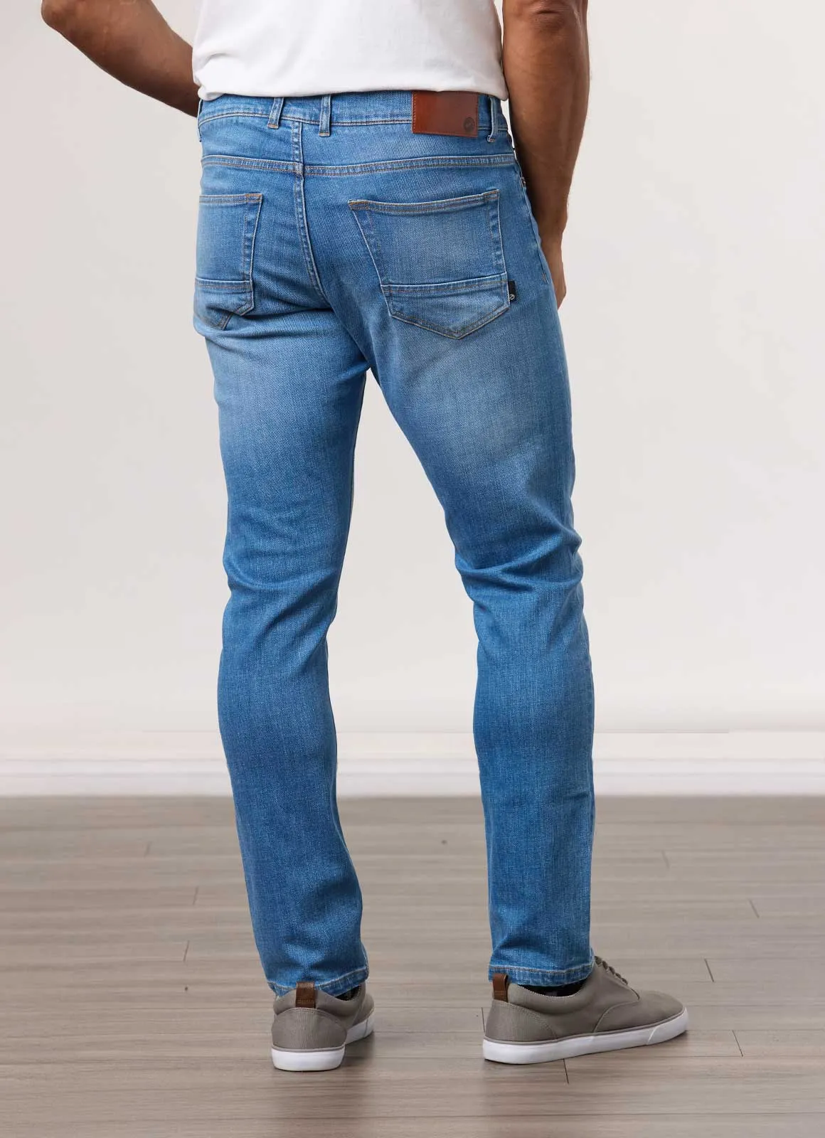 Tapered Stretch Denim Jeans