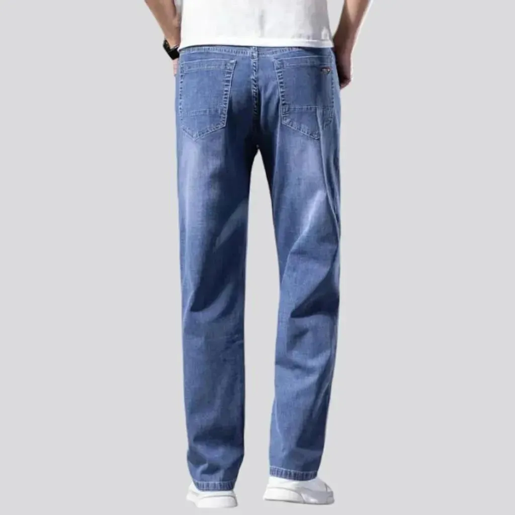 Thin men's stonewashed jeans