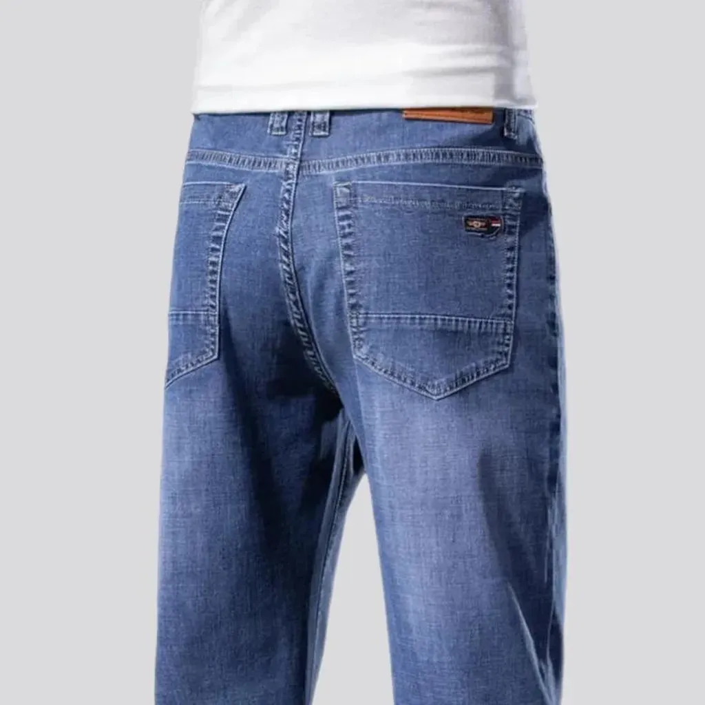 Thin men's stonewashed jeans