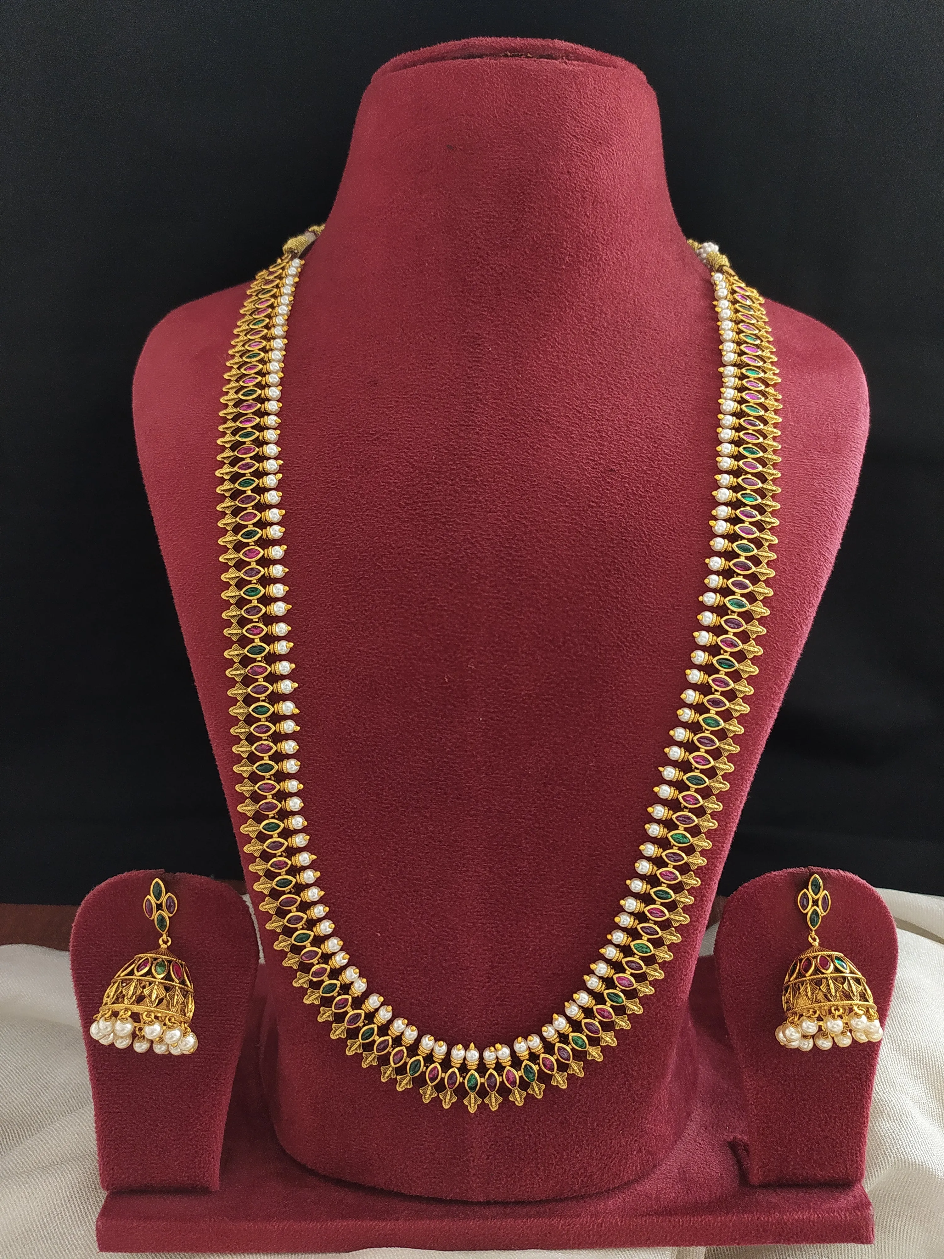 Timeless Antique Kemp Stone Long Haram with Matching Jhumki - Intricately Designed with Attached Pearls