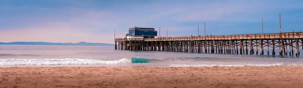 Timeless Beauty: Panoramic Vista of Newport Beach's Pier and Waves