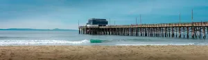 Timeless Beauty: Panoramic Vista of Newport Beach's Pier and Waves