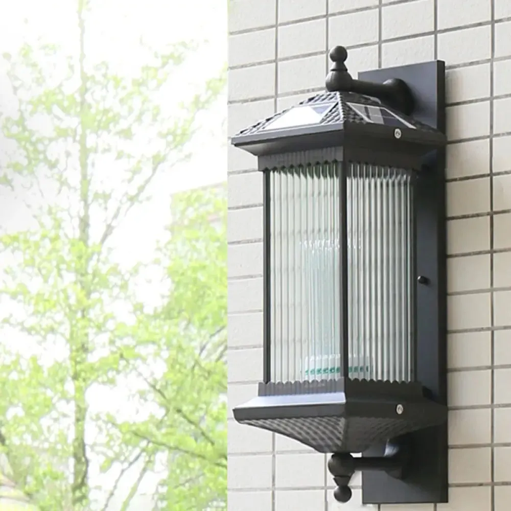 Traditional Glass LED Outdoor Wall Light with Solar Power and Ribbed Design.