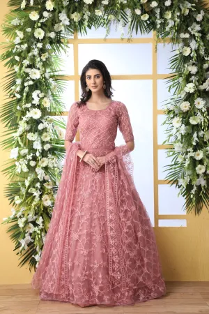 Unique Dusty Peach Colored Party Wear Embroidered Net Gown With Dupatta