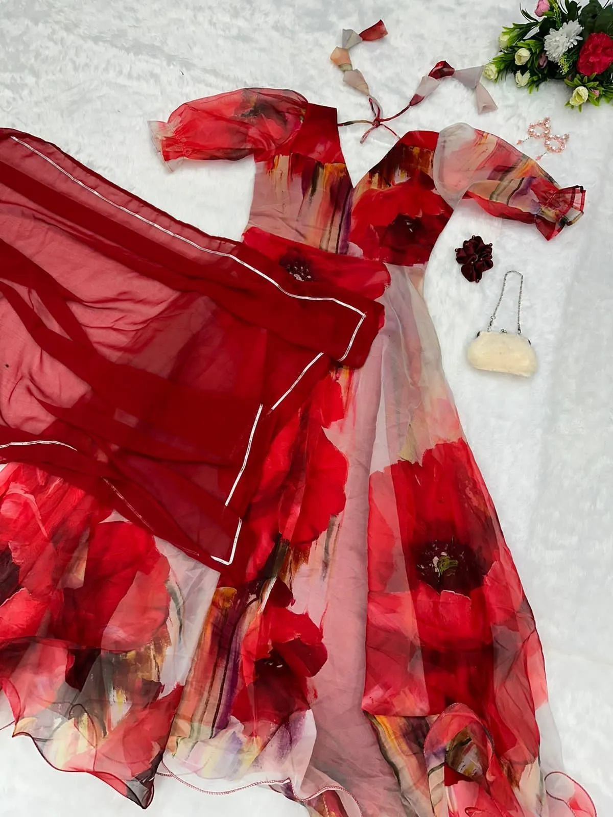 Unique White Color Gown With Maroon Flower