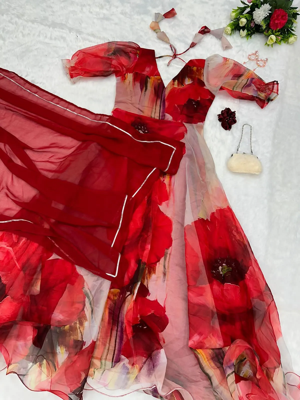 Unique White Color Gown With Maroon Flower