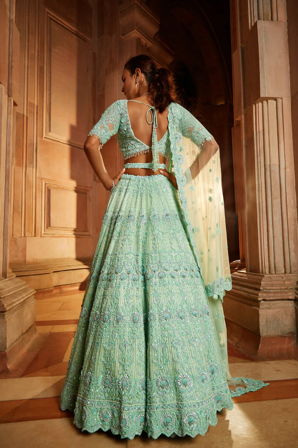 Vibrant Mint Green Tulle Lehenga Choli Dupatta with a Worked Belt