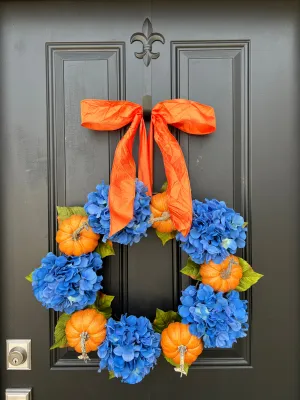 Vibrant Orange Pumpkin and Blue Hydrangea Wreath