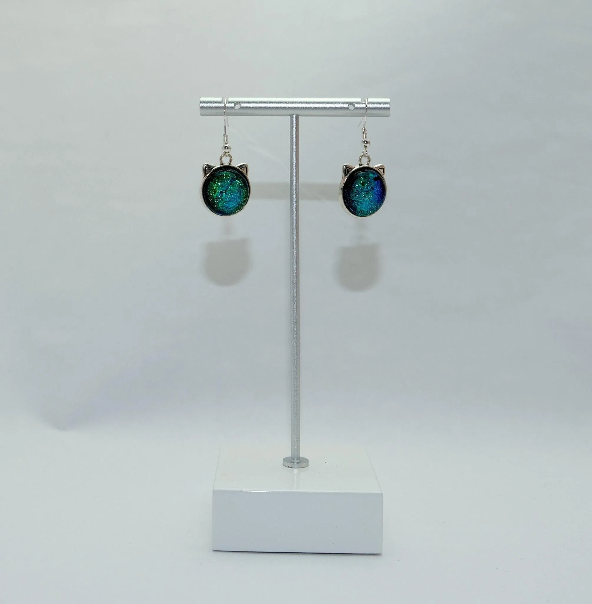 Whimsical Cat Head Shaped pierced Earrings - silver Tone with Green Blue Dichroic Glass